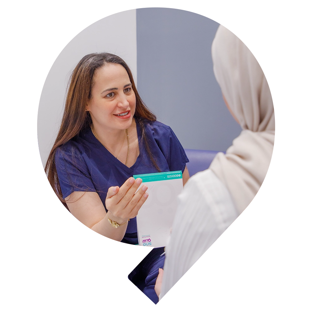 Specialist psychiatrist Dr Laila Mahmoud gently guiding a patient through a mental health session - Snö Wellness | Abu Dhabi